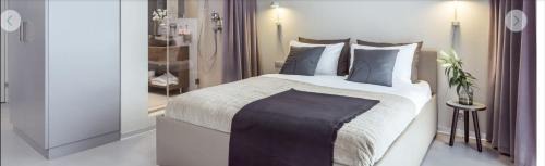 Saint-Sulpice Apartment | Mini studio avec cuisine, TV mural et sanitaires très confortable