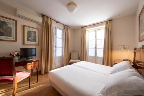 San Lorenzo de El Escorial Hotel | Miranda & Suizo