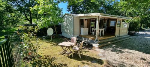 Hourtin Ski Chalet | Mobile home avec terrasse et piscine.