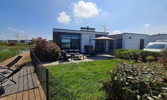 Olburgen House | Modern chalet with fenced garden, sauna, outdoor pool and river view in Olburgen