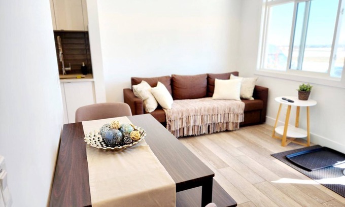 Southeast Calgary Condo | Modern Ground-Level Condo, Private Entrance, Walk to Shops, YMCA, Sleeps 4