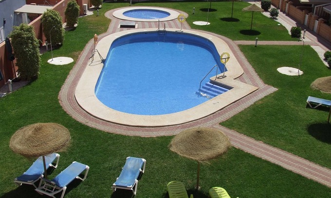 Roquetas de Mar Apartment | Modern Holiday Apartment, Pool View, Large Terrace, near Beach, wifi