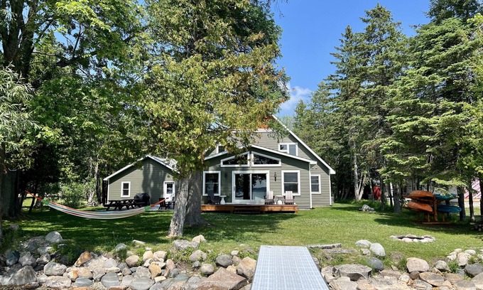 Cheboygan County House | Modern Lakefront Home on Burt w/Optional Pontoon