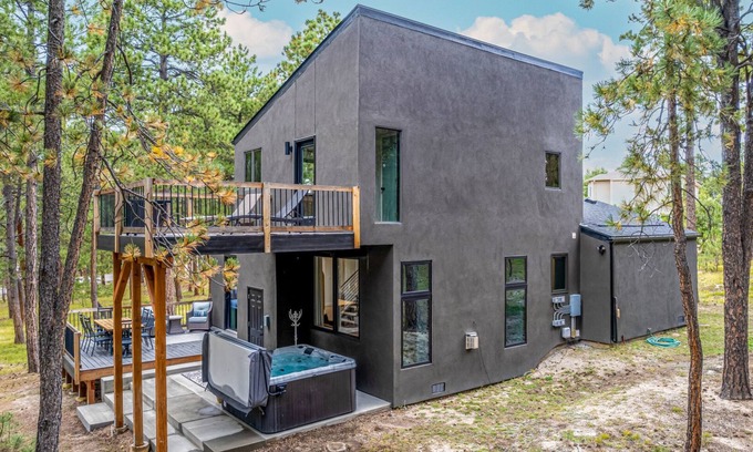 Woodmoor House | Modern Mountain Luxury - large forested lot with hot tub