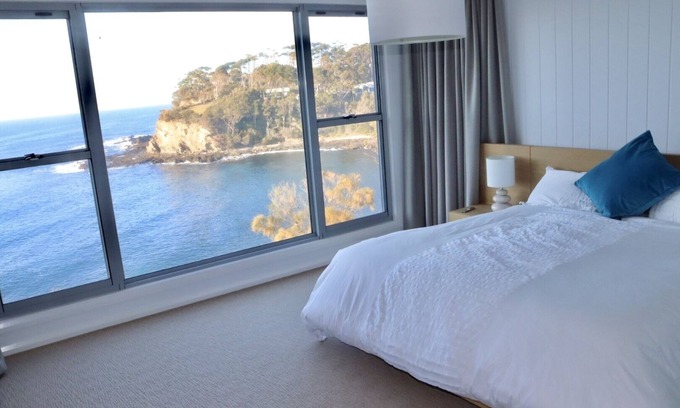 Malua Bay House | Modern Ocean Front Luxury 4 Bedroom Home with Spectacular Ocean Views