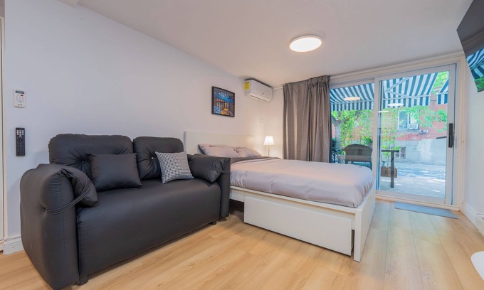 Cote-Des-Neiges—Notre-Dame-De-Grace Apartment | Modern Studio w/Patio & BBQ | Parking Included