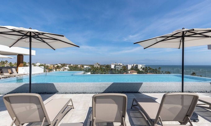 Bucerias Condo | Modern top floor condo w/Oceanview & Infinity Pool