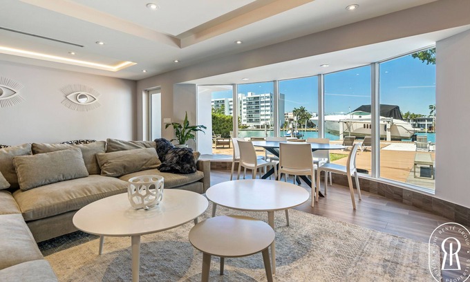 Surfside Villa | Modern Waterfront Villa in the Heart of Surfside with heated pool on the bay
