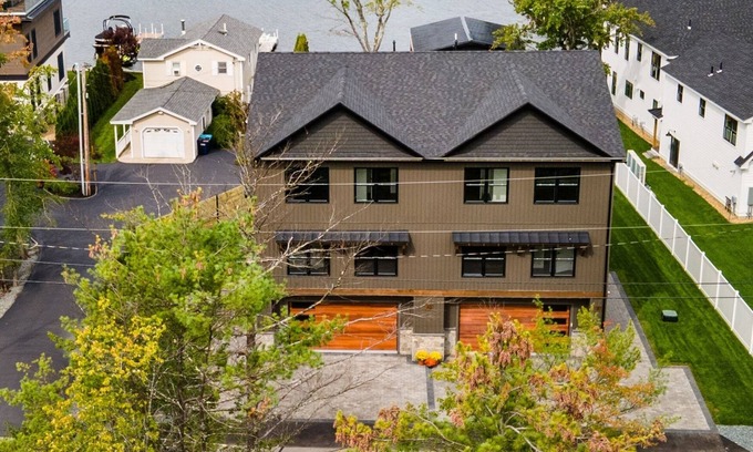 Lochmere House | Modern Winnisquam Lake House sleeps 10 Jacuzzi & Boat Slip