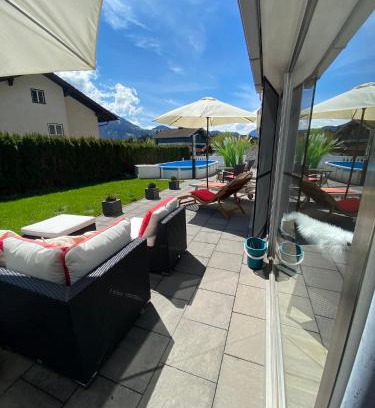 Adnet Apartment | Modernes Alpenapartment mit Sauna Wintergarten und Pool