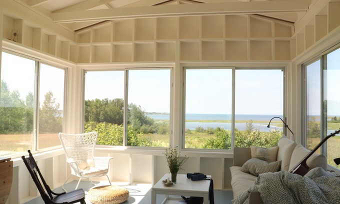 Amherst House | Modernized Waterfront Farmhouse with Wood Stove on 9 Acres of Land