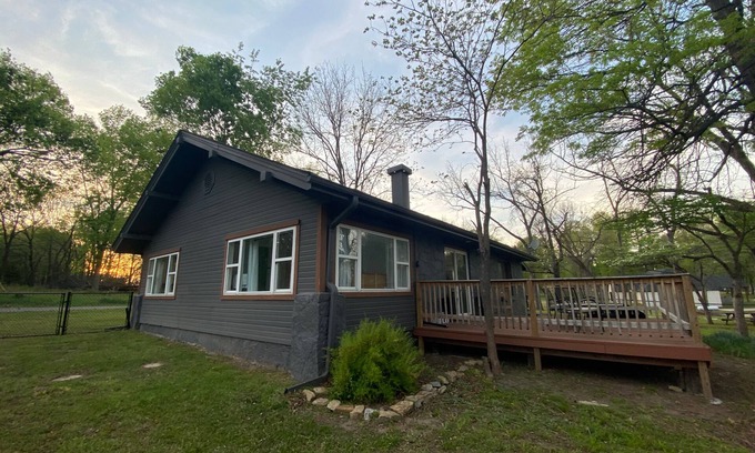 Afton House | Monkey Island Escape sleeps 8, surrounded by nature with views of Grand Lake.