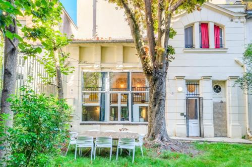 Quartier de Rochechouart Apartment | MONTMARTRE Sacré-Coeur, appartement jardin 6 à 8P