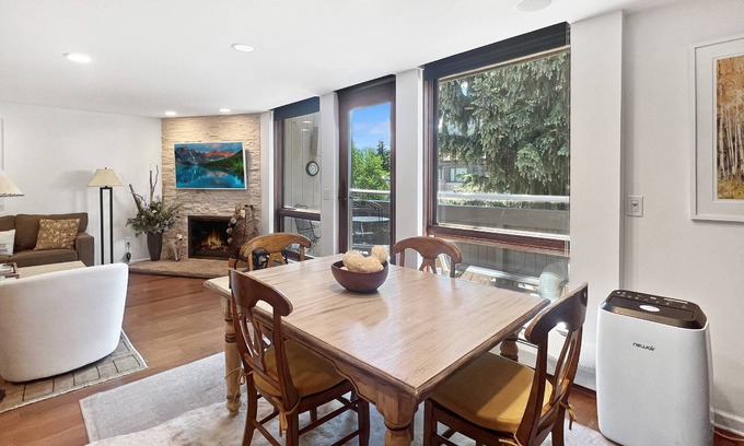 Aspen Condo | Mountain Views On Main St Aspen. Walk to Everything! Balcony, Gas FP, Elevator, Covered Parking, HT