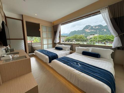 Tersusun Batu 5 Hotel | Muzi Boutique Hotel