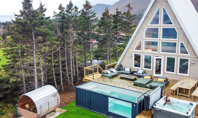 Aspy Bay House | Mystical Beachfront Chalet , Hot tub , Sauna and Heated Container Pool