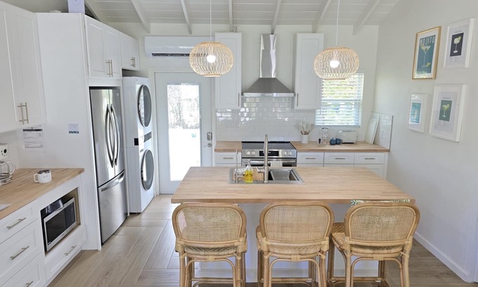 Great Exuma Villa | NEW 2 bdrm Sunset Villa on 1+ acre tropical garden directly on Hoopers Beach