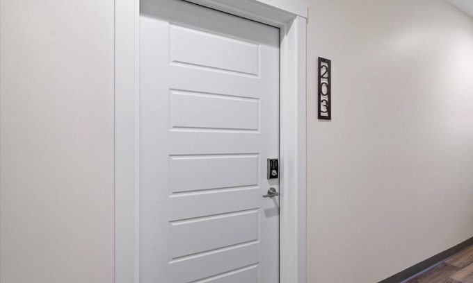 Evansville Apartment | New Boutique Hotel Suite on Haynie's Corner: KING Bed, Parking, Security & More!