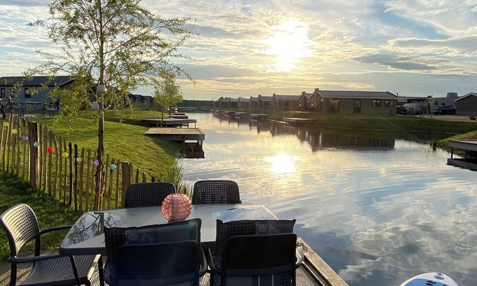 Municipality of Kampen House | NEW Elegant Holiday Home Chalet on a Lake in Kampen, Netherlands Boat waterfront