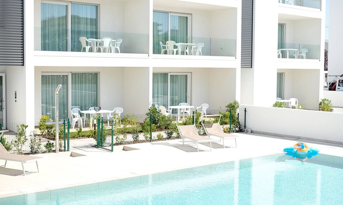 Faro Apartment | NEW in Jesolo with swimming pool, near the sea. Apartment 11
