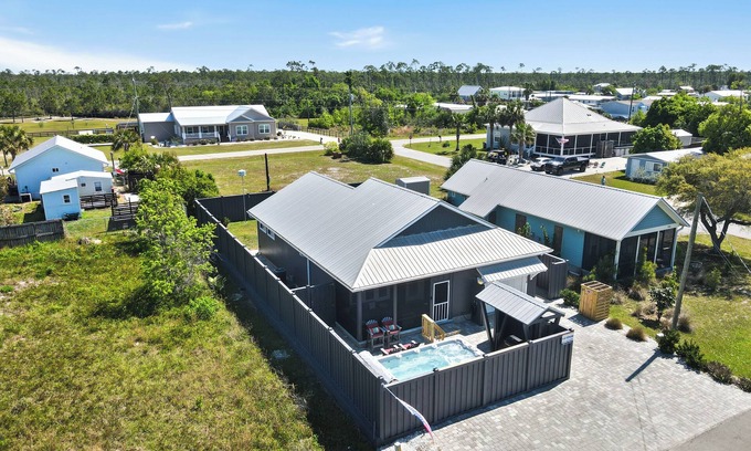 Port St. Joe House | NEW LISTING! Special Shell features 2BD/2BA w/private, fenced yard, swim spa, outdoor fireplace!