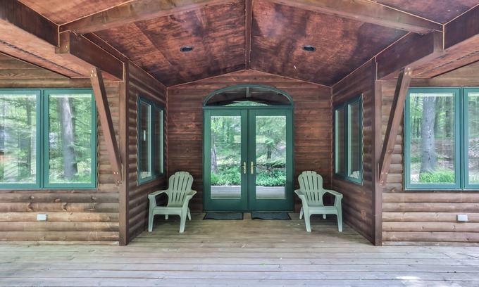 Lake Tomahawk House | NEW! Private, waterfront home with glass enclosed sunroom, gazebo and fire pit.