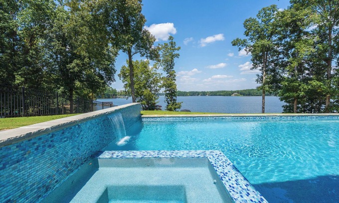 Buckhead House | NEW Stunning Lakefront Heated Pool Spa Game Room Putting Green Dock