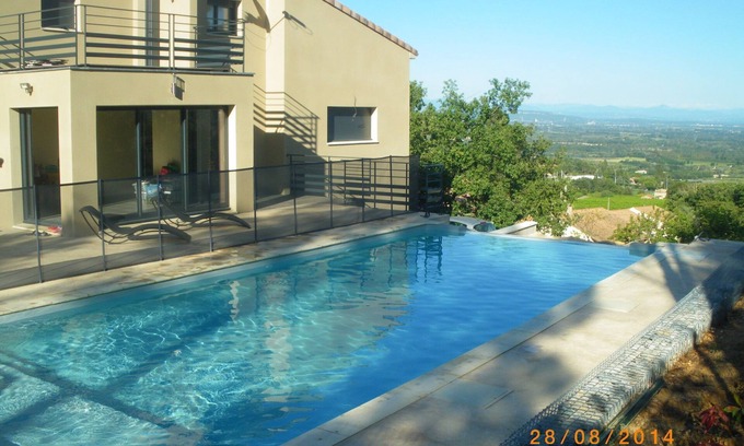 Saint-Julien-de-Peyrolas Villa | New villa-8 to12 persons-isolated-6 bedrooms-sauna and swimming pool with opt heating