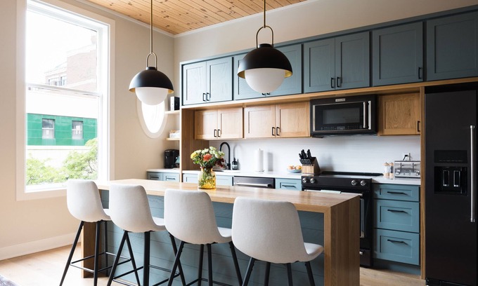 Traverse City Condo | Newly Renovated Luxury Loft with Rooftop Patio in the Heart of Downtown TC