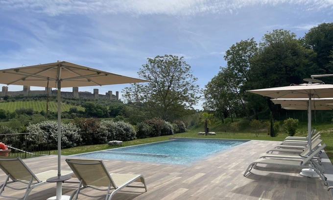 Monteriggioni Apartment | Nice apartment for 2 people with WIFI, A/C, pool, TV, pets allowed and parking, close to Siena