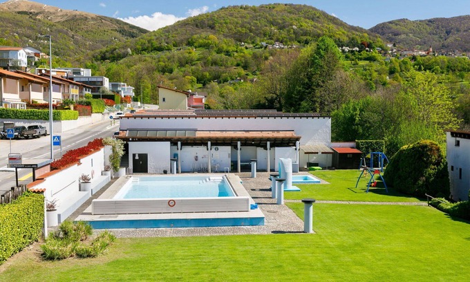 Sonvico Apartment | Nice apartment for 5 people with pool, WIFI, TV, patio, pets allowed and panoramic view