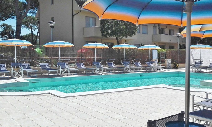 Marina di Cecina Apartment | Nice apartment for 6 guests with A/C, pool, WIFI, TV, patio and pets allowed