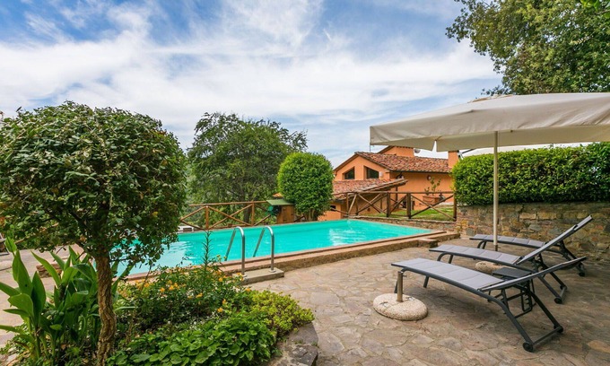 Castagneto Carducci Villa | Nice apartment in villa for 4 guests with A/C, pool, WIFI, TV, patio and pets allowed