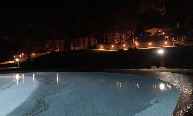 Castagneto Carducci Villa | Nice apartment in villa for 5 guests with pool, A/C, WIFI, patio, pets allowed and parking