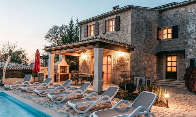 Brkac House | Not far from the picturesque town of Motovun, on the surrounding hills, is this stone vacation home.