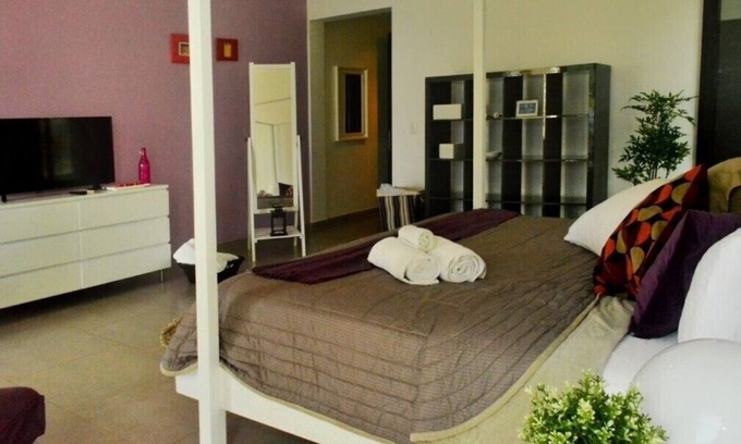Los Brazos Condo | Oceanfront 4-bedroom Condo with WiFi and AC in lovely Sosúa