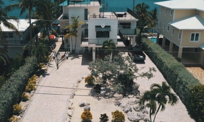 Tavernier House | Oceanfront Fishing Paradise with Dockage, Pool, & Pet Friendly