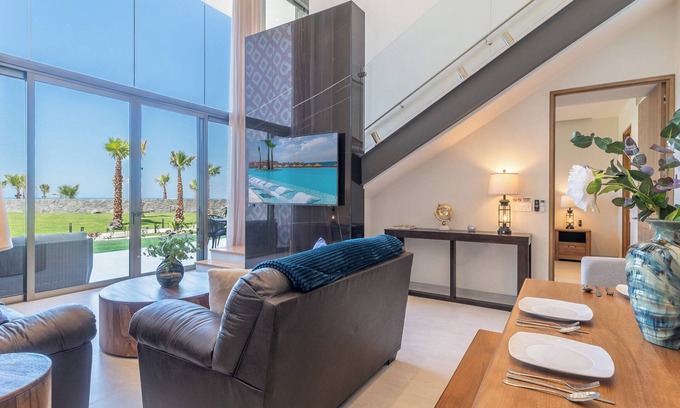 Bella Vista Condo | One 102: Elegant Beachfront Getaway with Unmatched Views