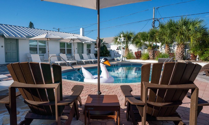 Treasure Island Resort | One bedroom poolside suite. Steps to beach and John’s Pass. HEATED POOL.