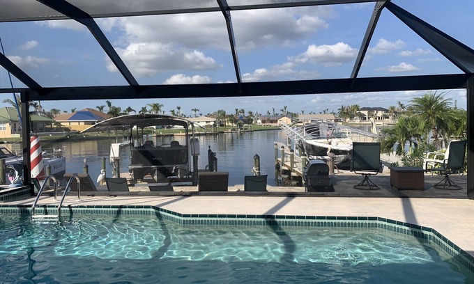 Caloosahatchee House | Orchid Lighthouse Canal Pool home with New waterfront Patio!