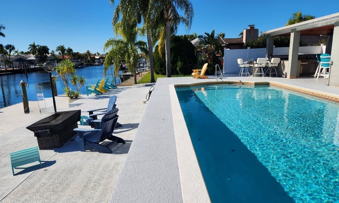 Gulf Harbors House | Outdoor lovers dream home- Pool, outdoor kitchen, private dock, and so much more