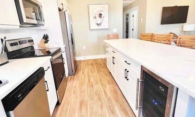 Corolla Condo | Oyster & Pearl Beautiful New Single Level Condo