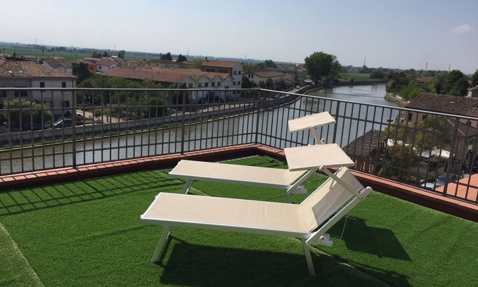 Codigoro Apartment | Palazzo Spada - App. Flamingo penthouse with terrace overlooking the Po River