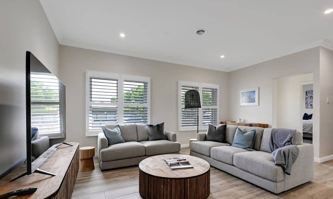 Orange House | Paradise on Prince - Sleek & Stylish, Pets Allowed