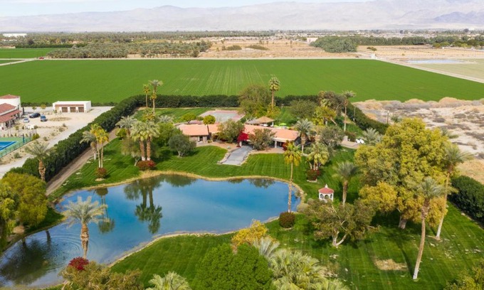 Palm Springs House | Paradiso by AvantStay Pool Lake Fire Pit Billiards Room Elegant Secluded Estate