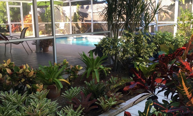 Venice Gardens House | Peaceful South Venice Home in Tropical Garden Setting.