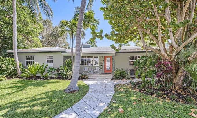 Parrot Cove House | Peacock Oasis - Retro Vibes and Poolside Lounging in Parrot Cove