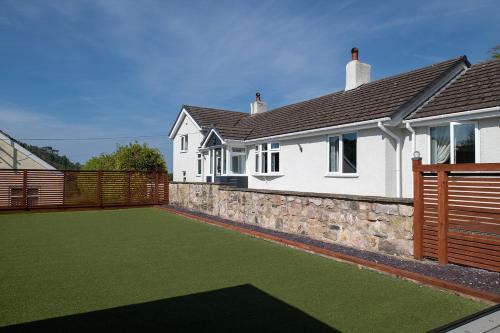 St George House | Pen y coed with hot tub and sauna surrounded by countryside views