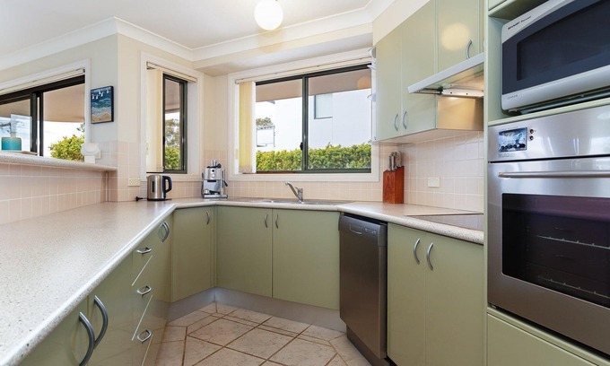 Soldiers Point Apartment | Peninsula Waters, 2/2-4 Soldiers Point Road - three bedroom unit, spacious private courtyard & WIFI