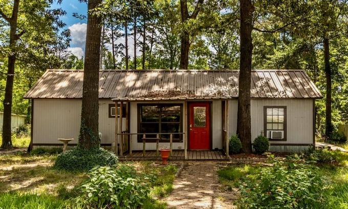 Ore City House | Pet-friendly campground cabin retreat w/shared pool, firepit, lake access